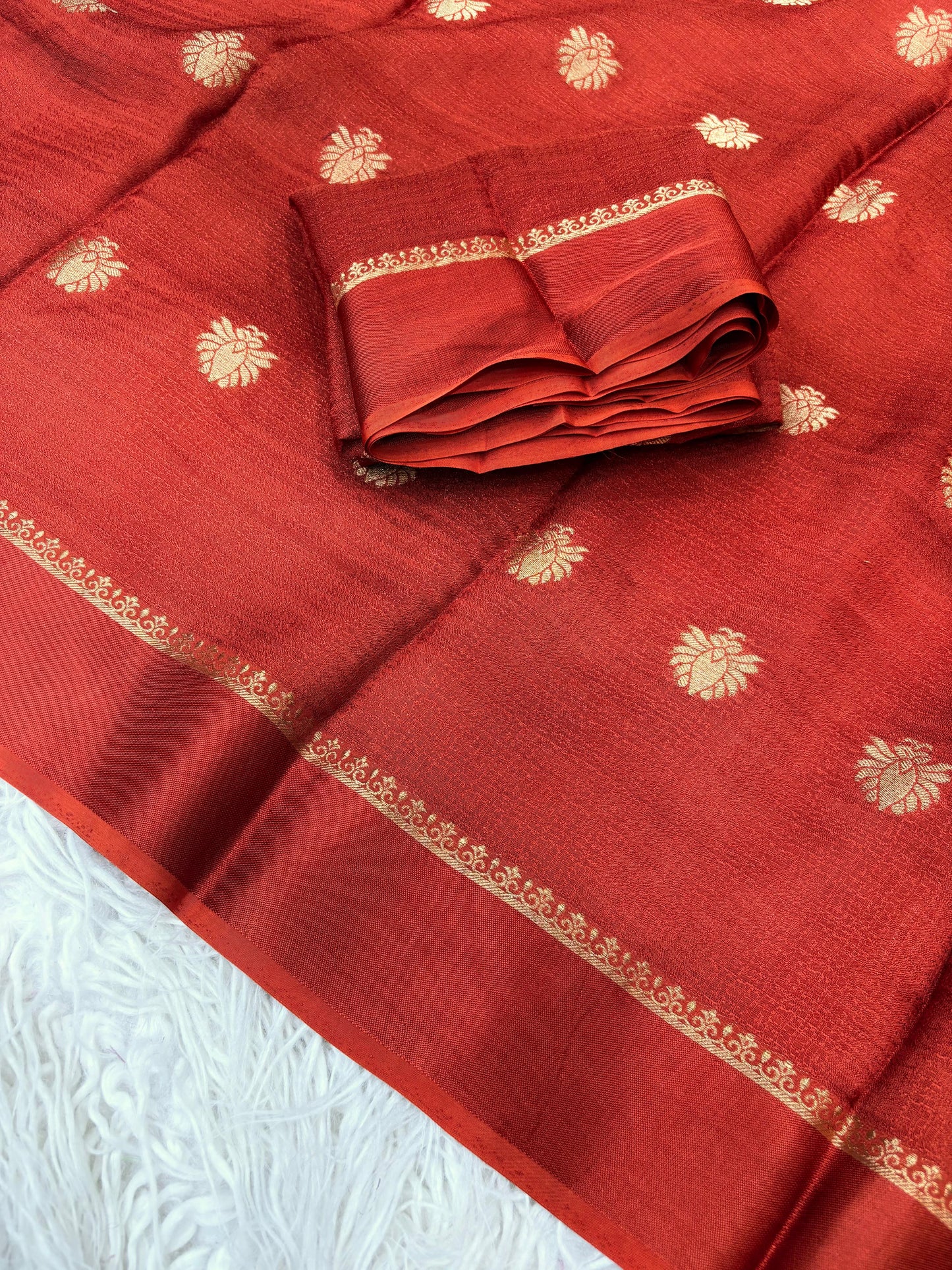 Rust Aura Zari Weave Saree