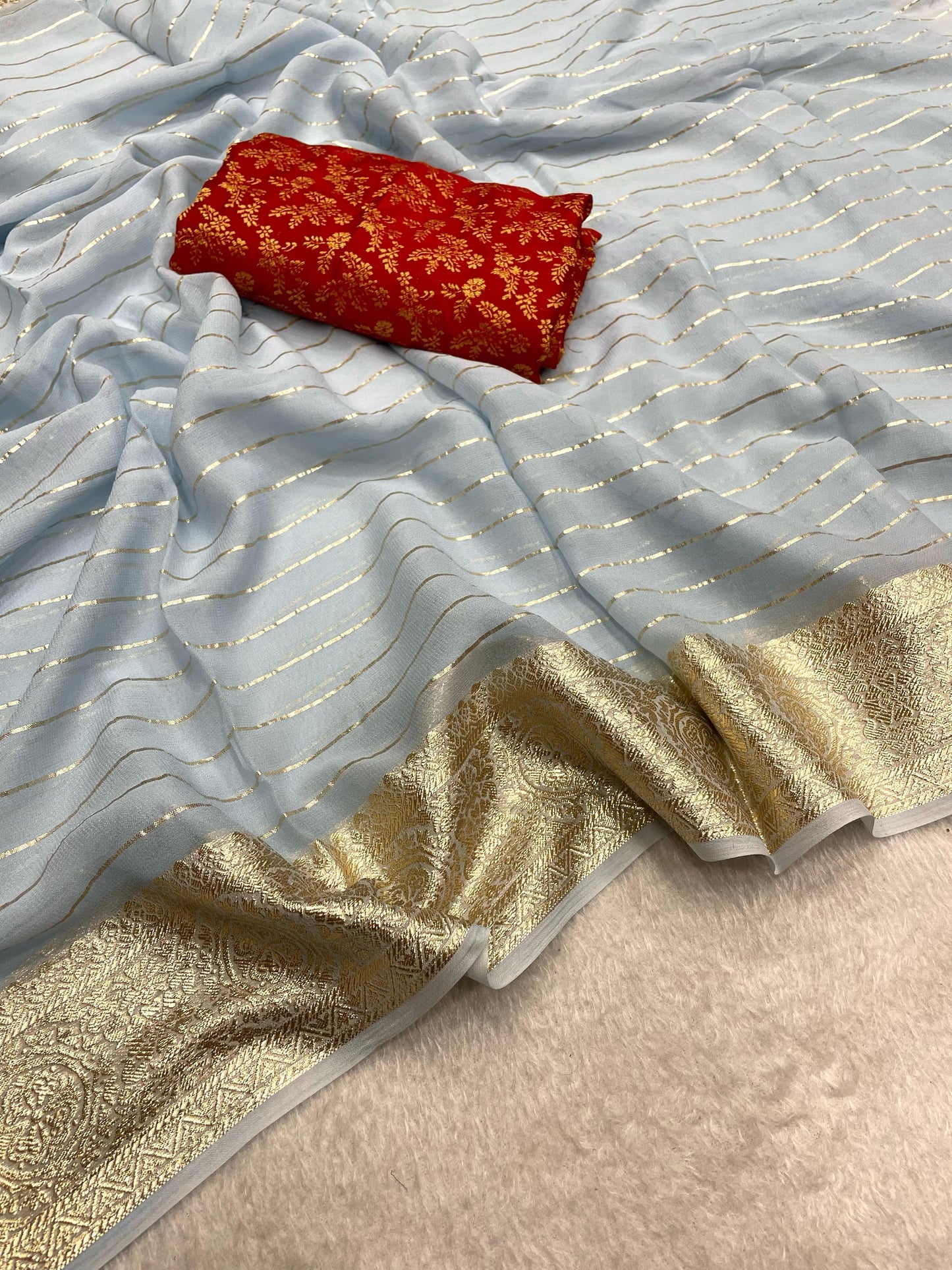 Sky Blue Color Viscose Georgette Fabric With Running Linning Weaving With Jacquard Border All Over