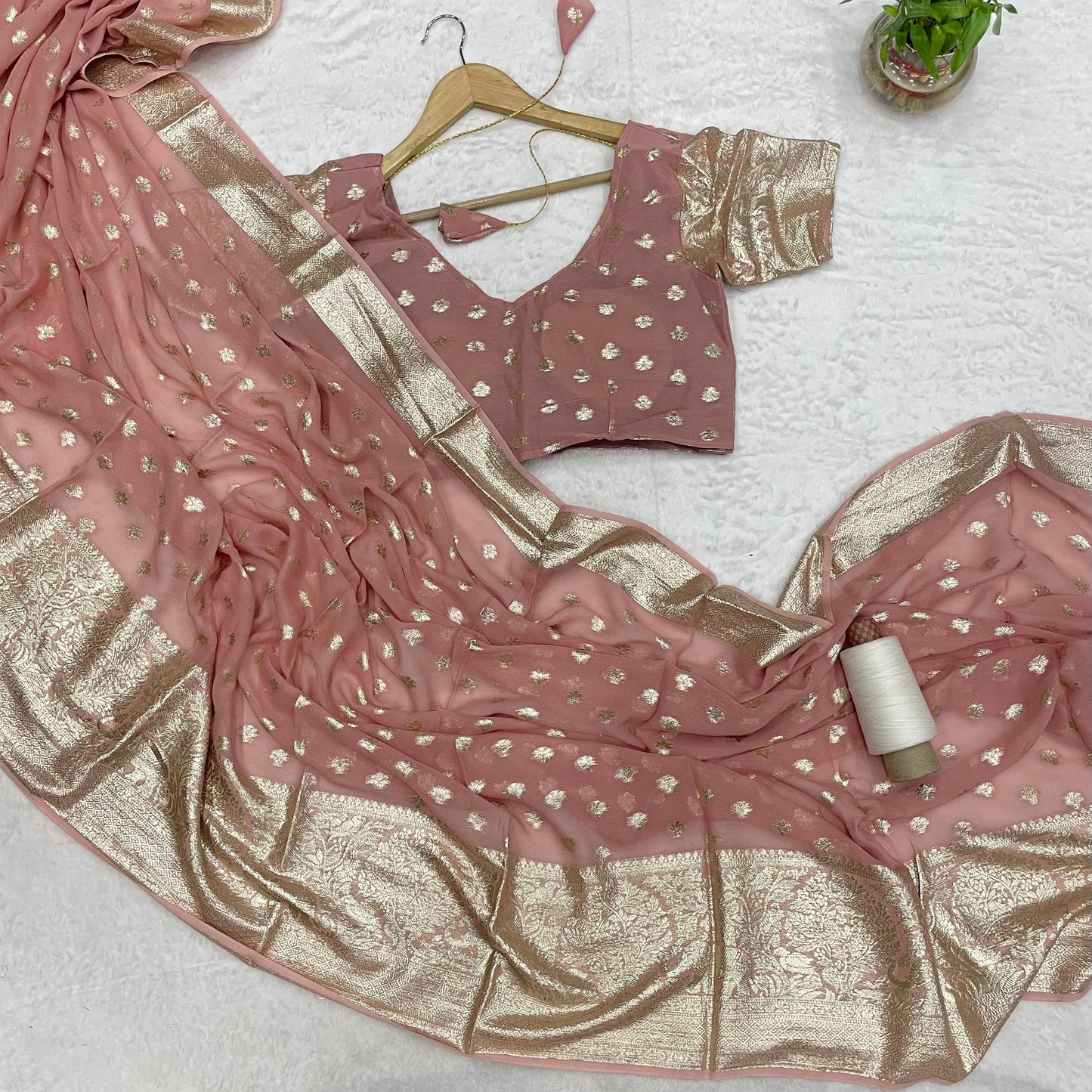 Pure Peach Elegance Redefined Viscose Georgette Festive Saree with Eco-Friendly Jacquard Border
