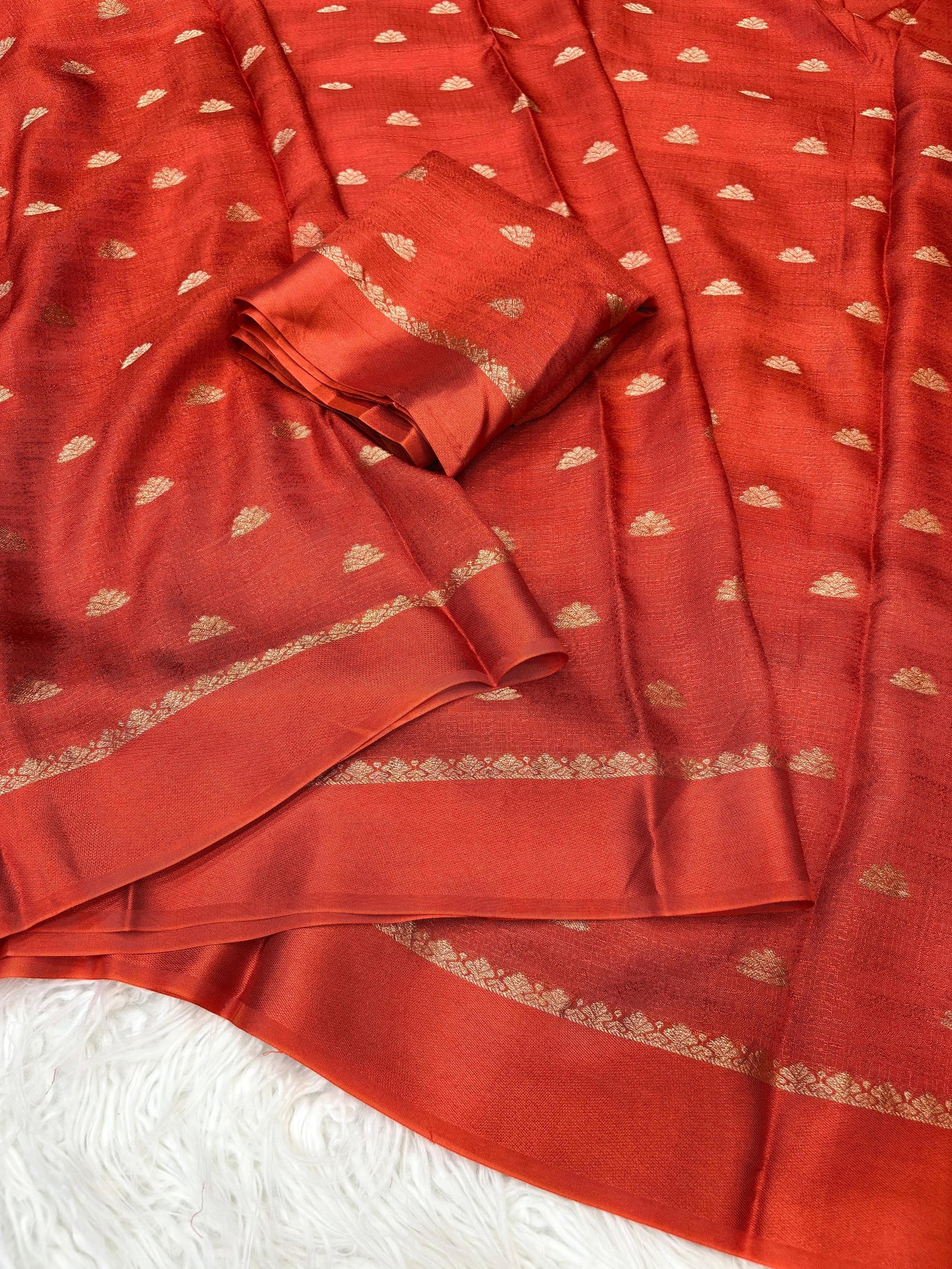Zari Blossom Rust Orange Silk Saree