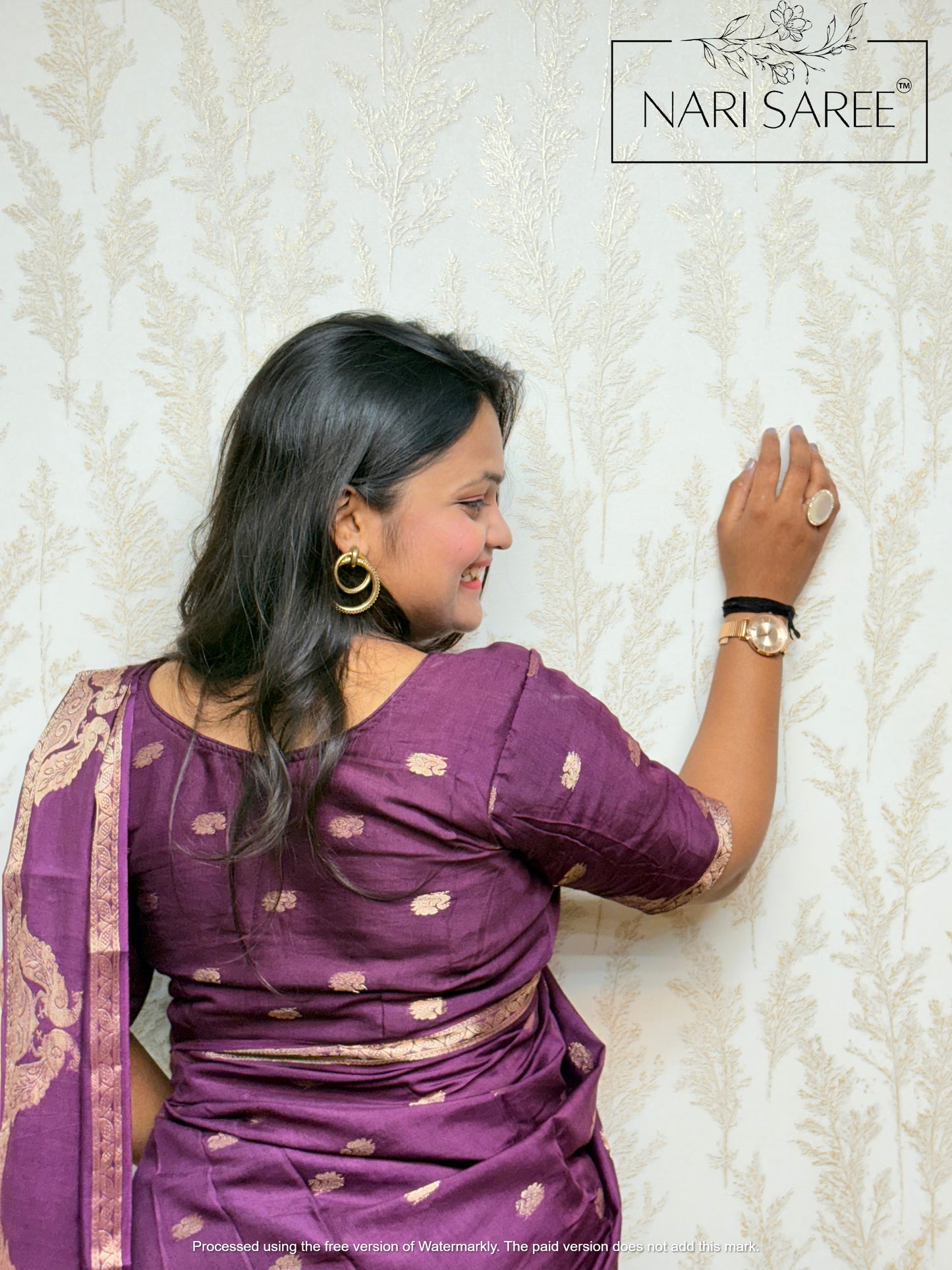 Rajasi - Plum Banarasi Silk Saree with Peacock Zari Border